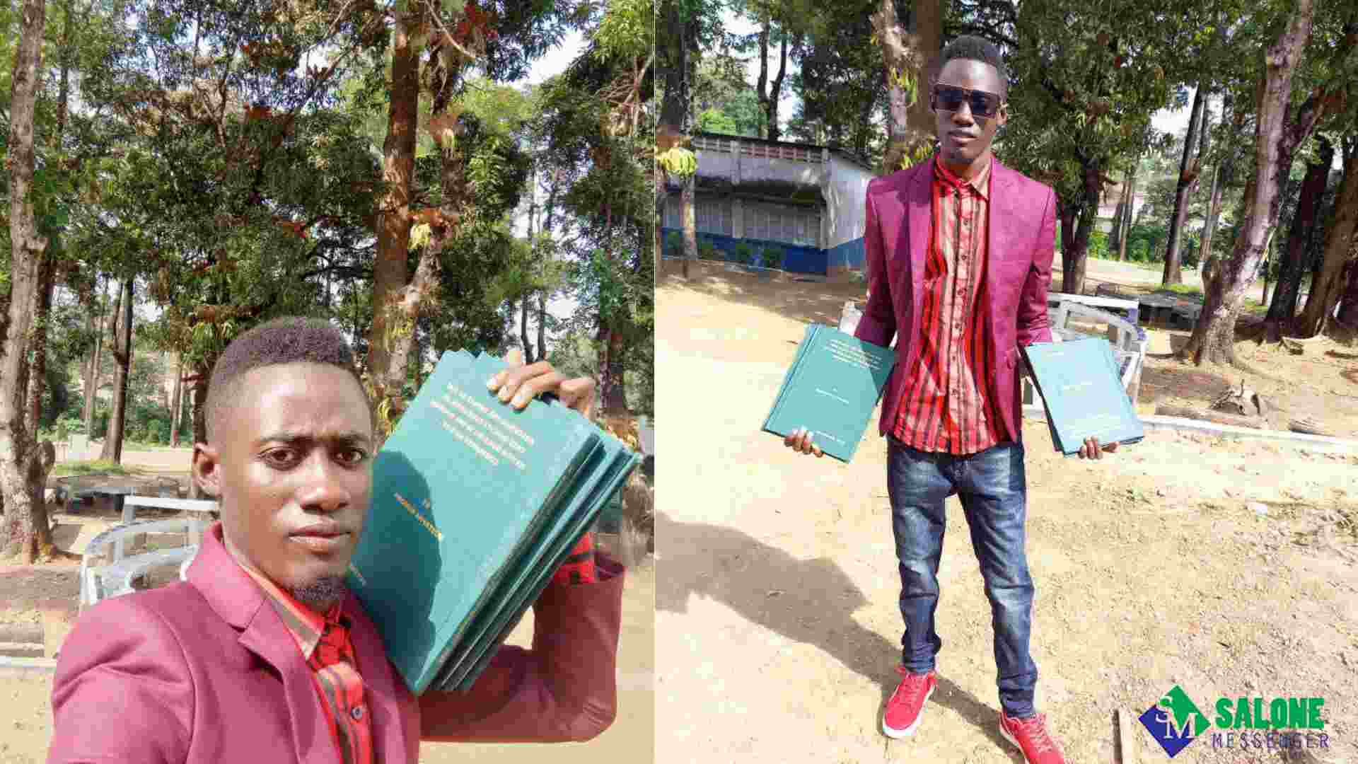 N'jala Student Celebrates as He Shows off Copies of His Dissertation N'jala Student Celebrates as He Shows off Copies of His Dissertation