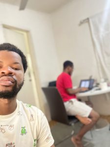 Photo of Daniel and his friend who helped him while in Ghana( A software developer)
