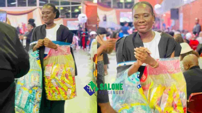 South African young Lady who use to sell Sweet and Chips to Pay Her University walk up the stage with bags of chips and sweets as a reminder of her journey on her graduation
