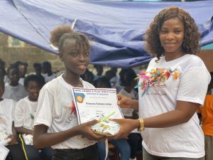 one of the participants receiving her certificate 