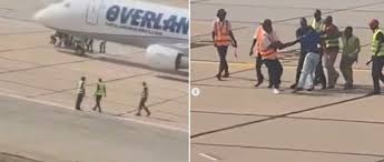 Man Arrested After Trying to Hide Under Aircraft He Thought Was Heading to the U.S. Man Arrested After Trying to Hide Under Aircraft He Thought Was Heading to the U.S.